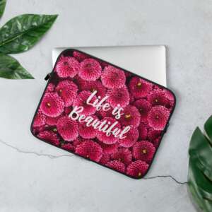 vibrant laptop sleeve with printed words life is beautiful